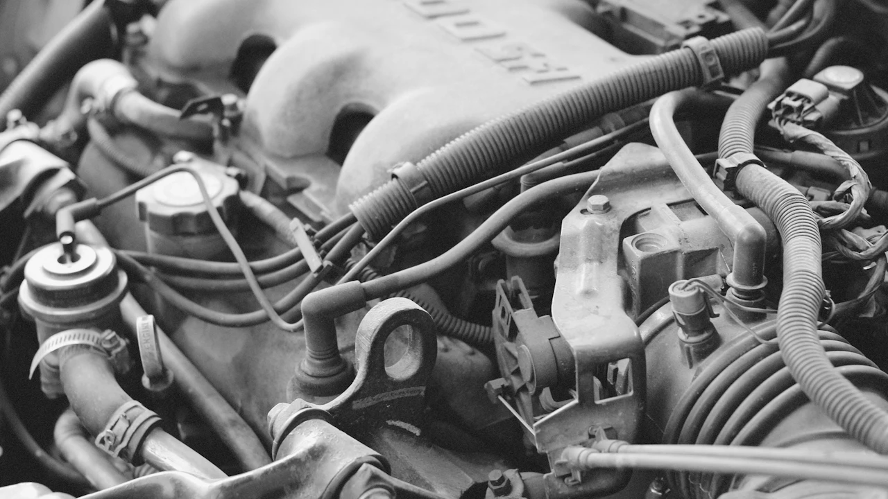 Checking the engine oil level on a dipstick