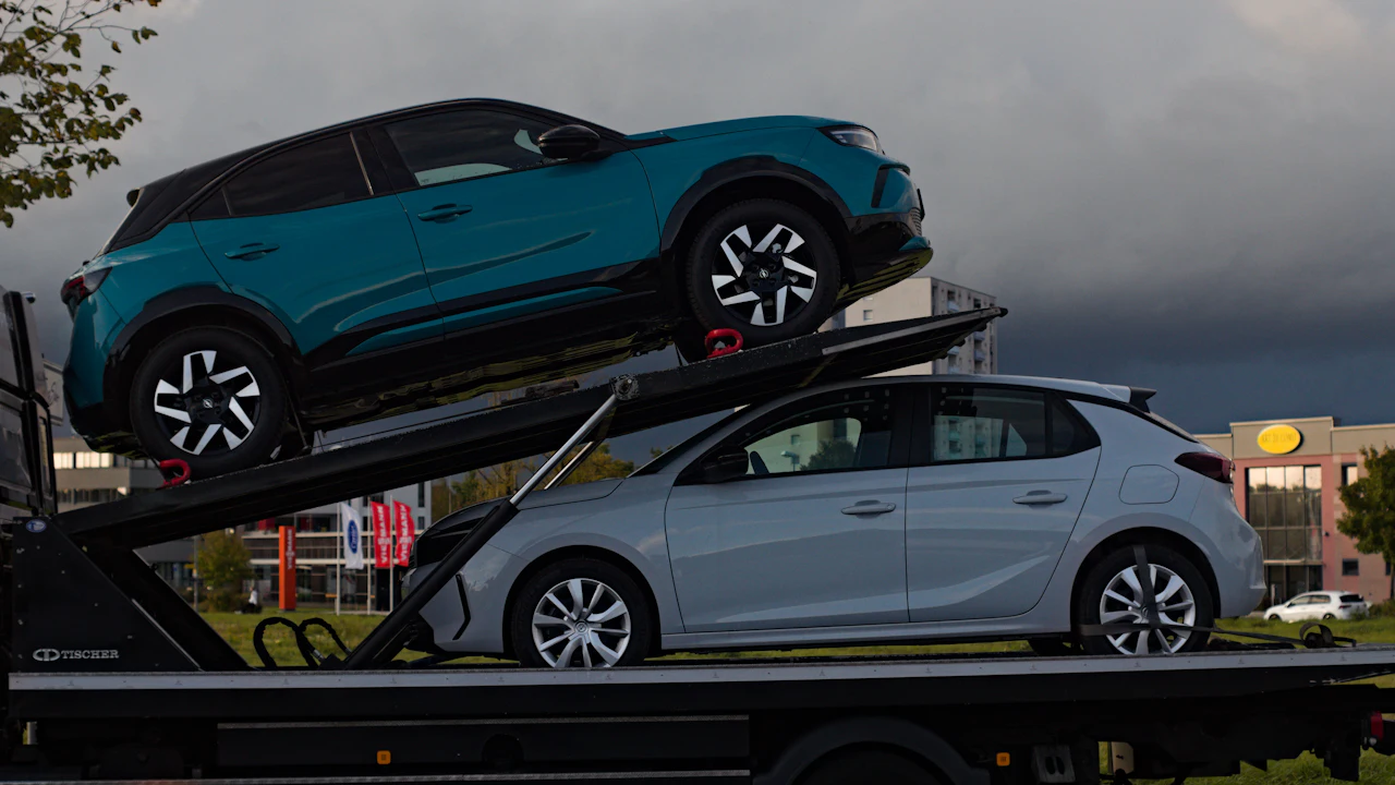 Cars loaded onto a car transporter truck
