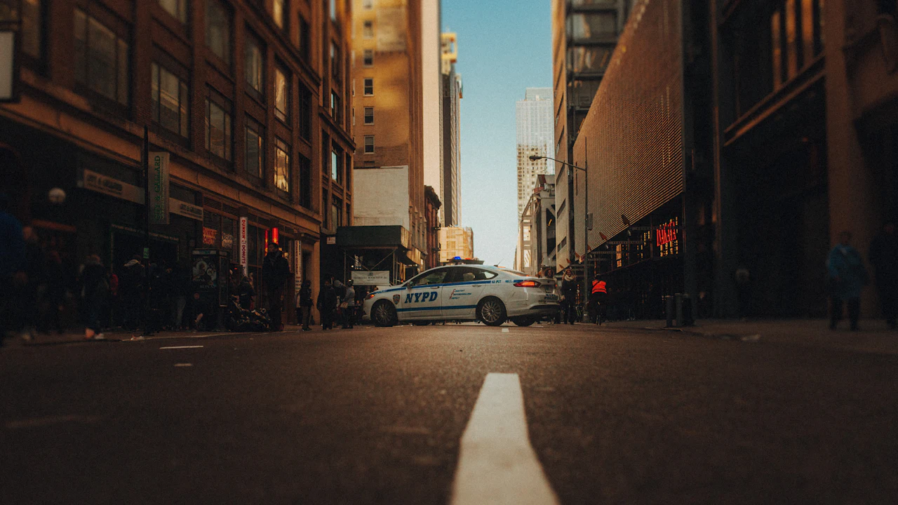 A police patrol car parked on a city street