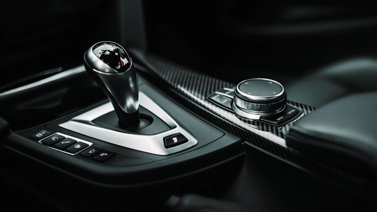 An automatic transmission gear selector on a car's center console