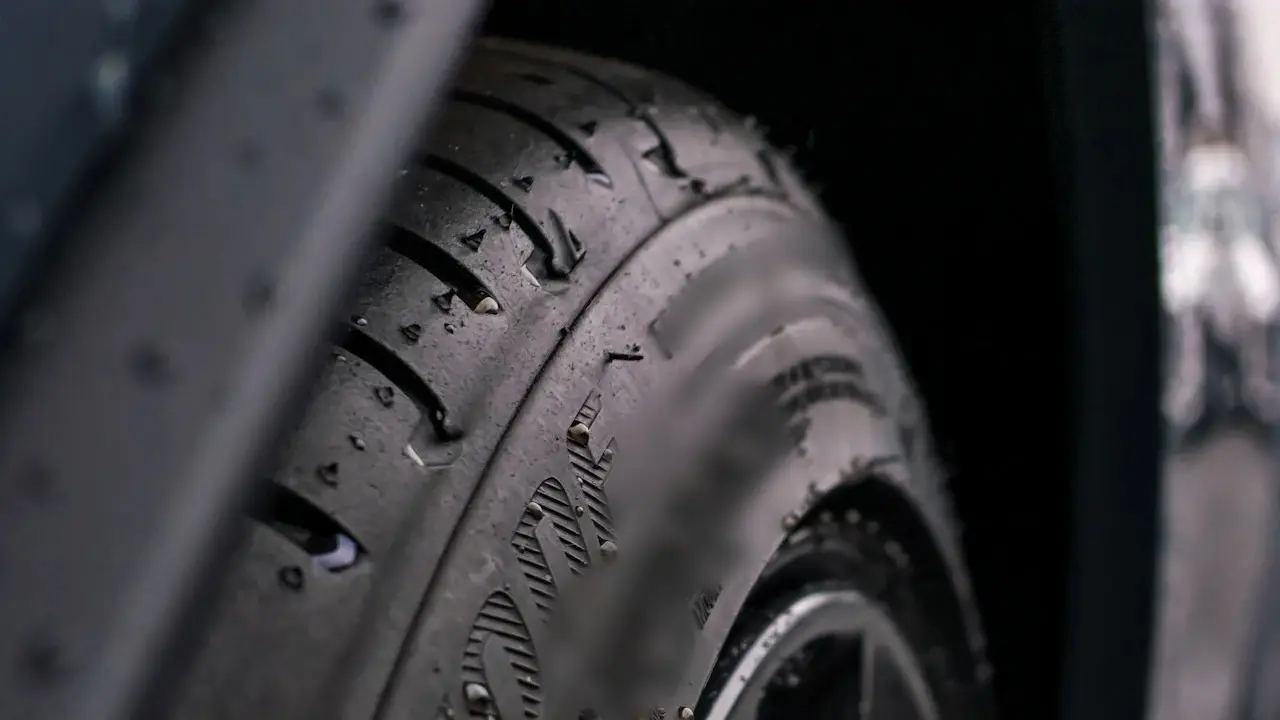 Close view of an SUV tyre's tread and sidewall.